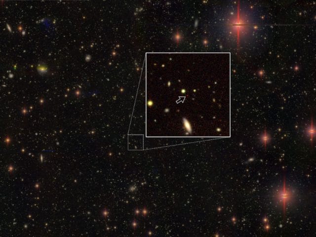 Colossal Radio Jet Illuminates Secrets of the Infant Cosmos